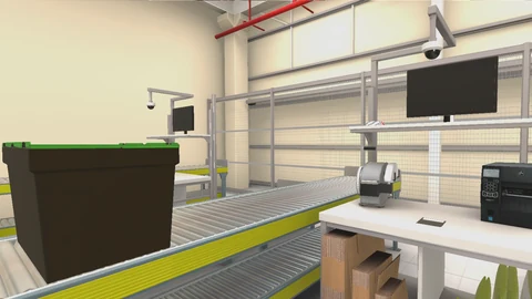 Packing workstation with a roller conveyor, storage bin, monitors, label printers and flattened boxes.